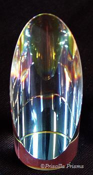 illusion spire crystal paperweight reflects the rainbow